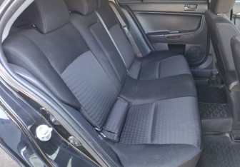 Подержанный автомобиль Mitsubishi Lancer Sedan 2012 года (12 фото)