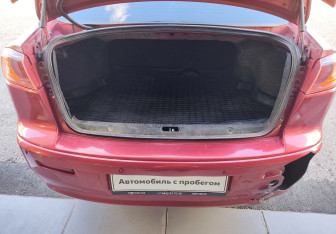 Подержанный автомобиль Mitsubishi Lancer Sedan 2008 года (15 фото)