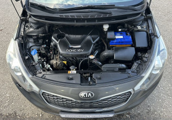 Подержанный автомобиль Kia Cerato Sedan 2013 года (13 фото)