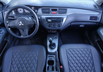 Подержанный автомобиль Mitsubishi Lancer Wagon 2008 года (10 фото)
