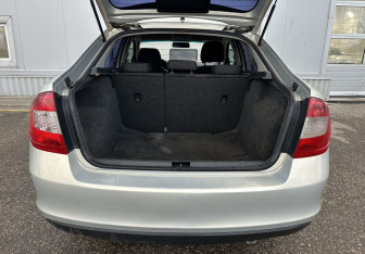 Подержанный автомобиль Skoda Rapid Wagon 2014 года (13 фото)