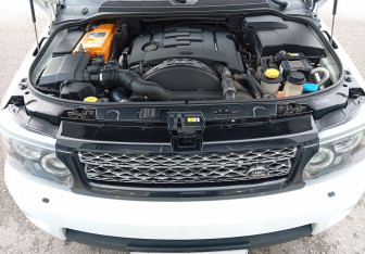 Подержанный автомобиль Land Rover Range Rover Sport 2013 года (14 фото)