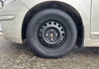 Подержанный автомобиль Nissan Tiida Hatchback 2011 года (14 фото)