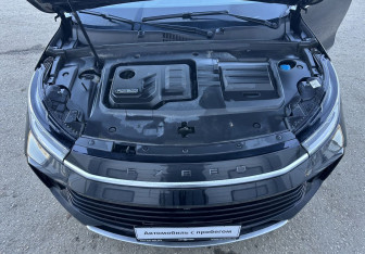 Подержанный автомобиль Exeed TXL 2023 года (13 фото)