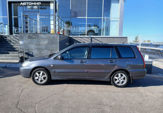Подержанный автомобиль Mitsubishi Lancer Wagon 2008 года (8 фото)