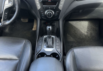 Подержанный автомобиль Hyundai Santa Fe 2015 года (11 фото)